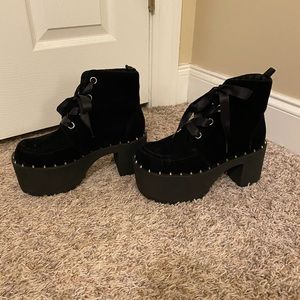 Black suede platforms with studs